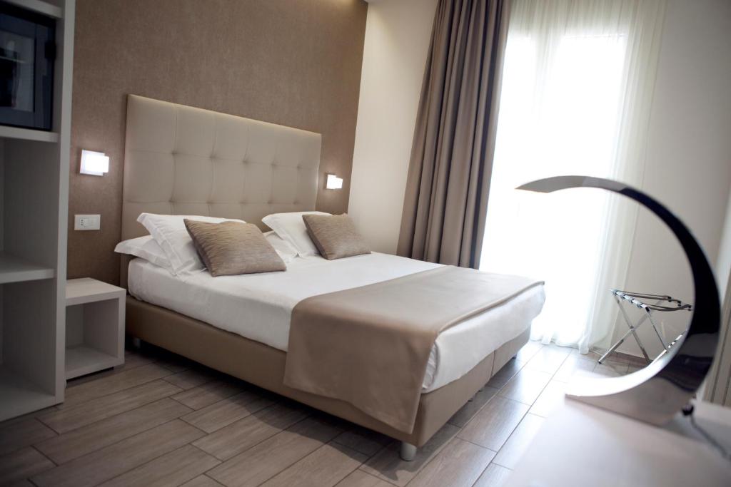 Двухместный (Двухместный номер с 1 кроватью или 2 отдельными кроватями) отеля L'Hotel, Римини