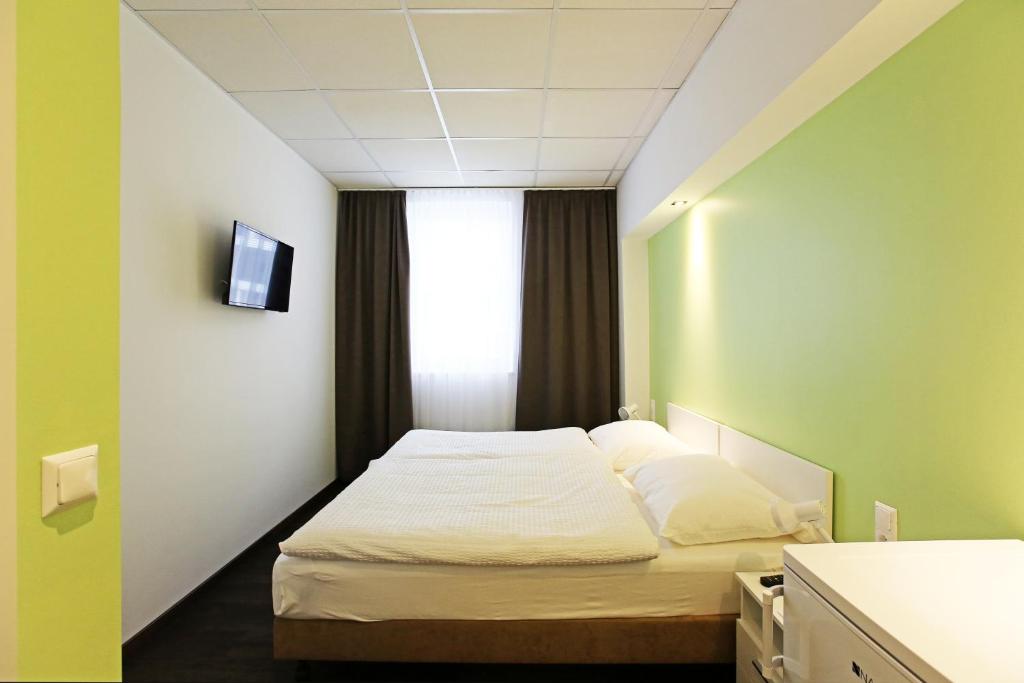 Двухместный (Двухместный номер с 1 кроватью или 2 отдельными кроватями) отеля Montagehotel Business & City, Линц