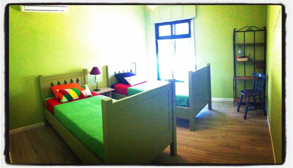 Двухместный (Двухместный номер с 2 отдельными кроватями и видом на реку) гостевого дома Al-Gharb Tavira Eco GuestHouse, Тавира
