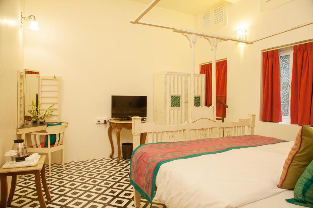 Двухместный (Номер Делюкс с кроватью размера «queen-size») отеля The Ivy House, Калькутта