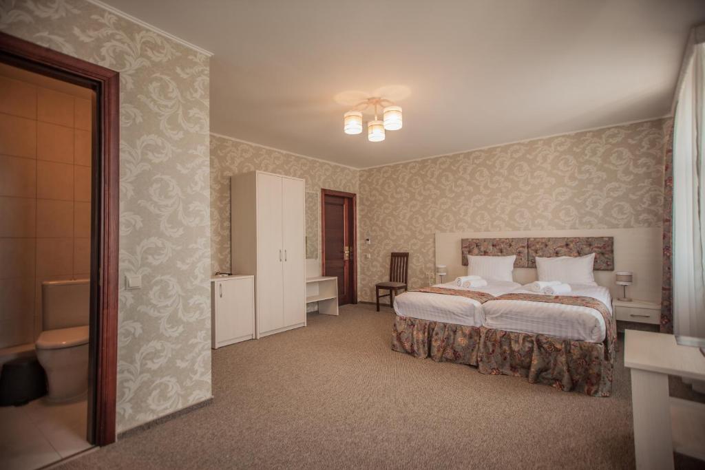 Двухместный (Двухместный номер с 1 кроватью и доступом в оздоровительный центр по утрам) отеля SanMari, Даугавпилс