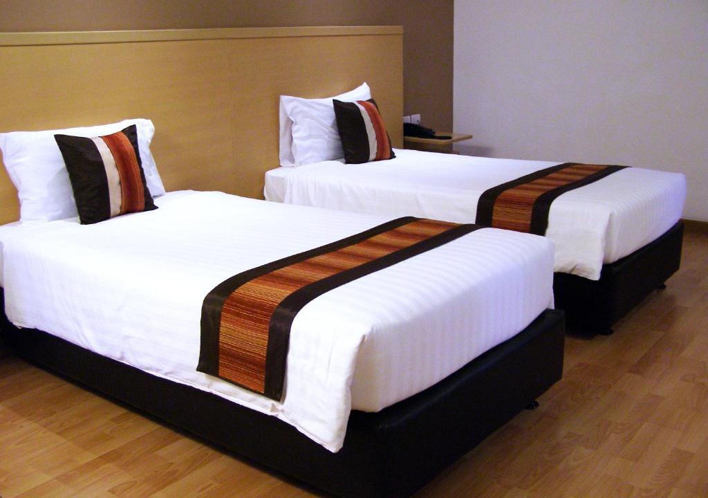 Двухместный (Улучшенный двухместный номер с 2 отдельными кроватями) отеля Iyarin @ Tuk Chang, Бангкок