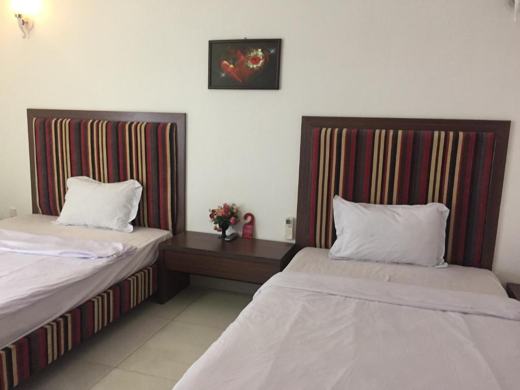 Двухместный (Улучшенный двухместный номер Делюкс с 1 кроватью или 2 отдельными кроватями) отеля DaNa Home Hotel - Apartment, Дананг