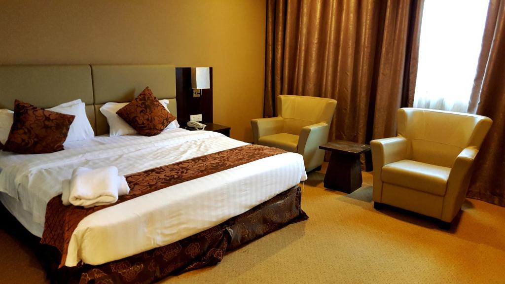 Двухместный (Представительский двухместный номер с 2 отдельными кроватями) отеля Lintas View Hotel, Кота-Кинабалу