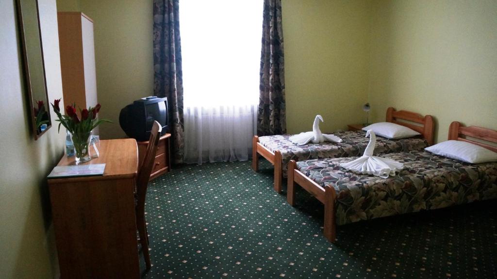 Двухместный (Стандартный двухместный номер с 2 отдельными кроватями) отеля Hotel Tukums, Тукумс