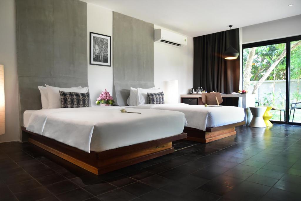 Двухместный (Двухместный суперлюкс с 2 отдельными кроватями - Бесплатный трансфер в 1 сторону) отеля Hillocks Hotel & Spa, Сием Рип