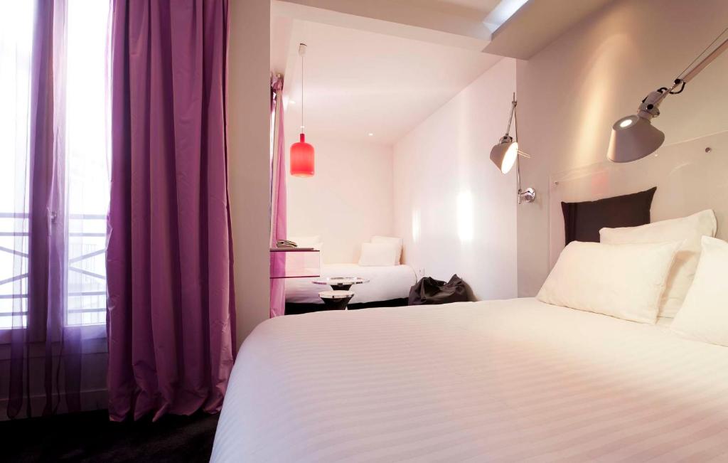 Двухместный (Двухместный номер Делюкс с 1 кроватью или 2 отдельными кроватями) отеля Color Design Hotel, Париж