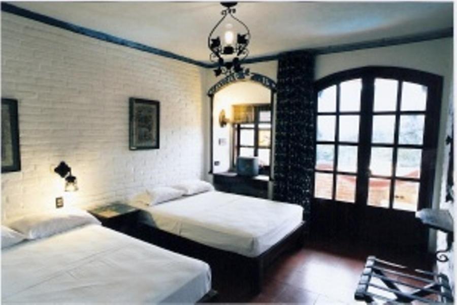 Двухместный (Двухместный номер с двумя двуспальными кроватями (для 1-4 взрослых)) отеля Hotel Paraiso Escondido, Пуэрто-Эскондидо