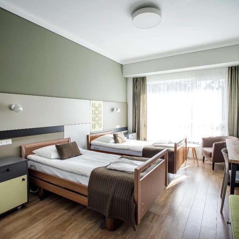 Двухместный (Двухместный номер с 2 отдельными функциональными кроватями и доступом в спа-центр) отеля UPA Medical SPA, Друскининкай