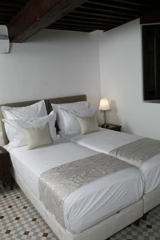 Двухместный (Улучшенный двухместный номер с 1 кроватью или 2 отдельными кроватями) отеля Riad Batchisarai, Фес