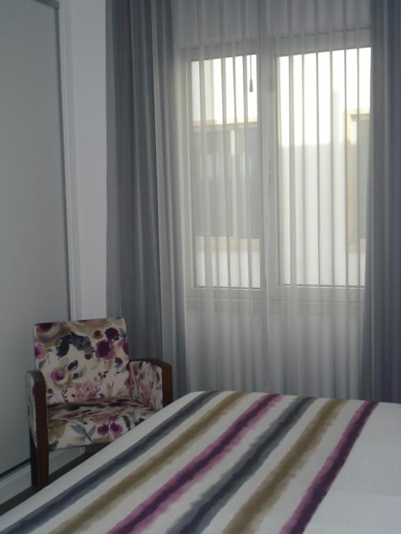 Двухместный (Двухместный номер с 1 кроватью или 2 отдельными кроватями и видом на внутренний двор) отеля Hotel Concha, Сан-Мартино-до-Порто