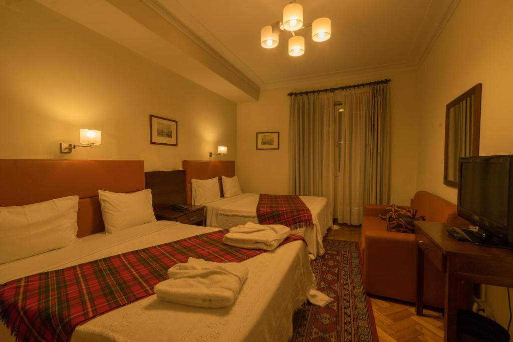 Двухместный (Двухместный номер Делюкс с 2 отдельными кроватями) отеля Pao de Acucar Hotel, Порту