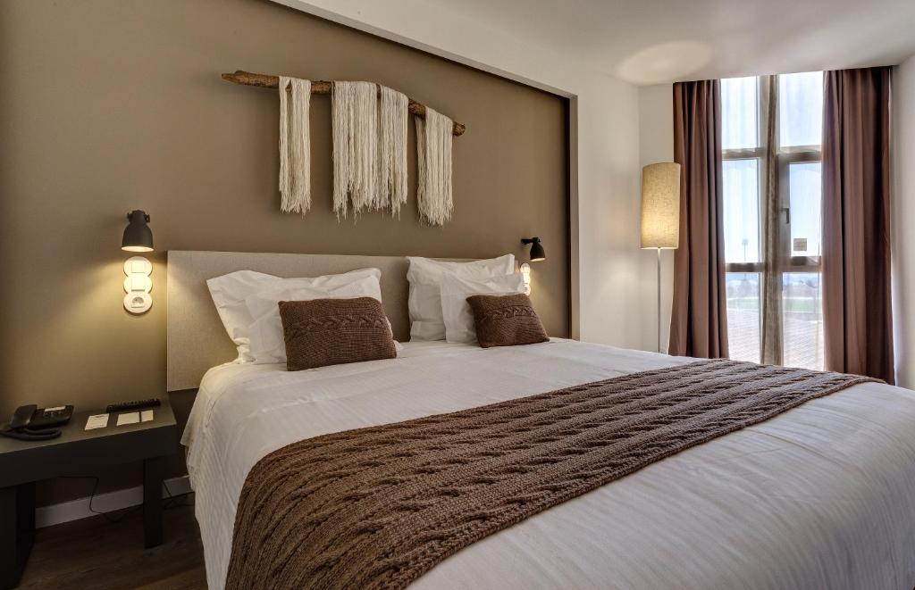 Двухместный (Двухместный номер с двуспальной кроватью и дополнительной кроватью) отеля Puralã - Wool Valley Hotel & SPA, Ковильян