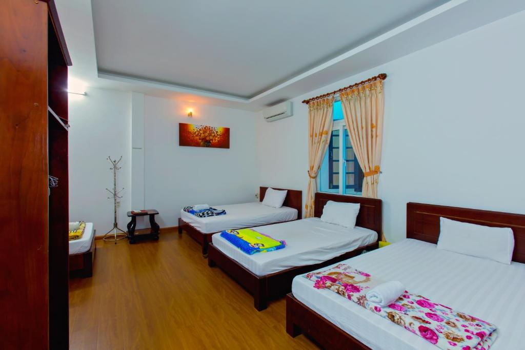 Номер (Кровать в общем 4-местном номере для мужчин и женщин) семейного отеля Mango Garden Hoi An Homestay, Хойан