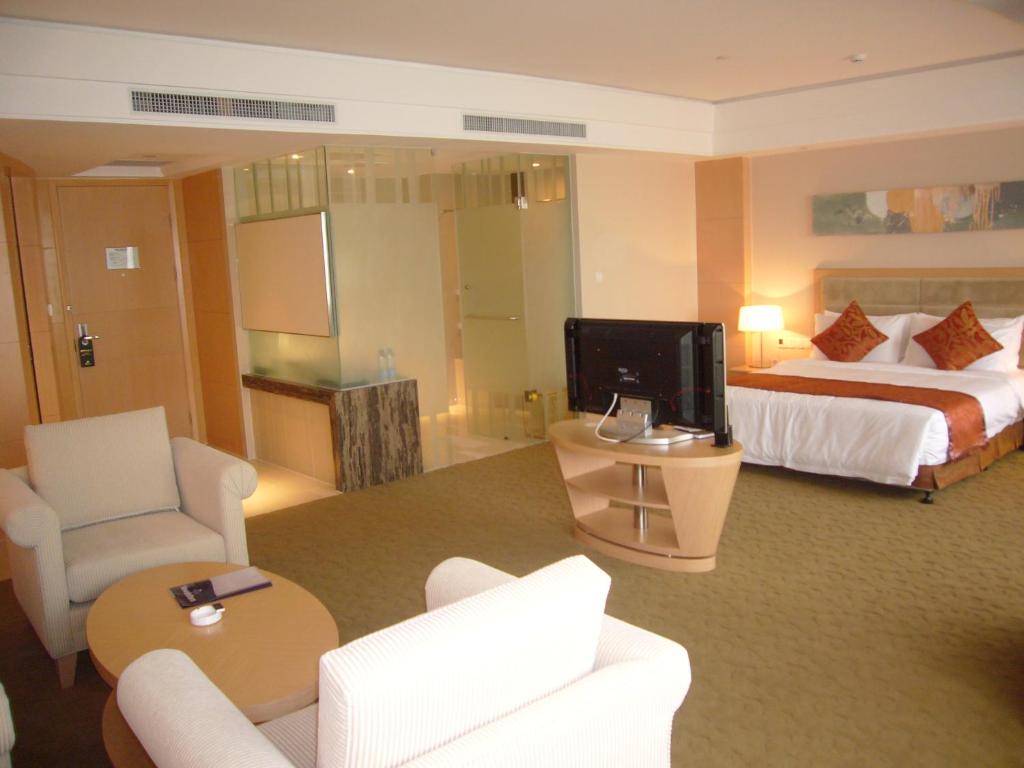 Двухместный (Двухместный номер Делюкс с 1 кроватью и видом на озеро) отеля Grand Metropark Hotel Suzhou, Сучжоу
