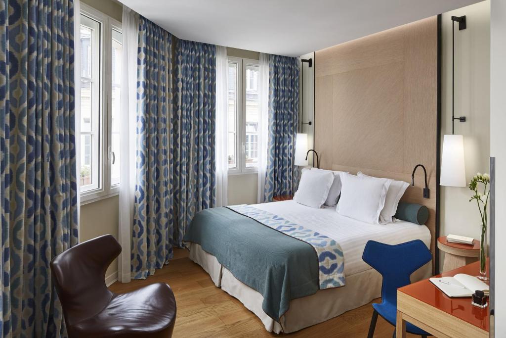 Двухместный (Номер Делюкс с доступом в спа-салон и фитнес-центр) отеля Hôtel Bel Ami, Париж