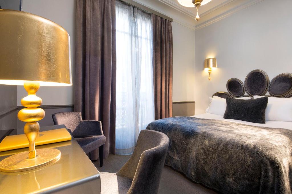 Двухместный (Классический двухместный номер с 1 кроватью или 2 отдельными кроватями) отеля Hotel Lumen Paris Louvre, Париж