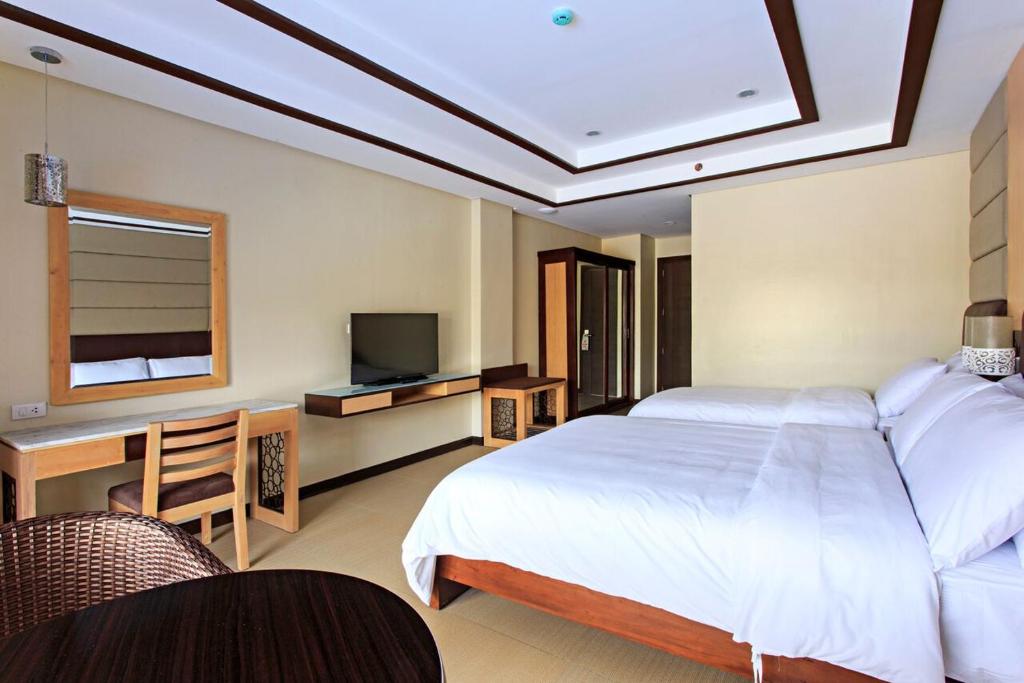 Двухместный (Стандартный двухместный номер с 2 отдельными кроватями) курортного отеля Cebu Westown Lagoon - South Wing, Себу