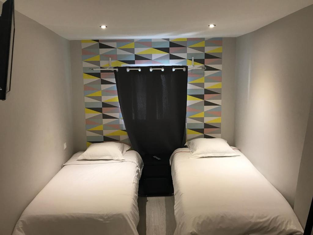 Двухместный (Двухместный номер с 2 отдельными кроватями) отеля Hôtel Beauséjour, Марсель