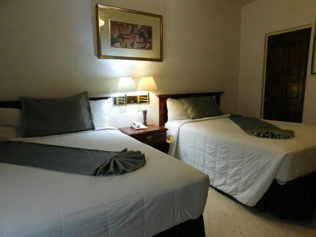 Двухместный (Двухместный номер с 2 двуспальными кроватями) отеля Hotel Urdiñola Saltillo, Сальтильо