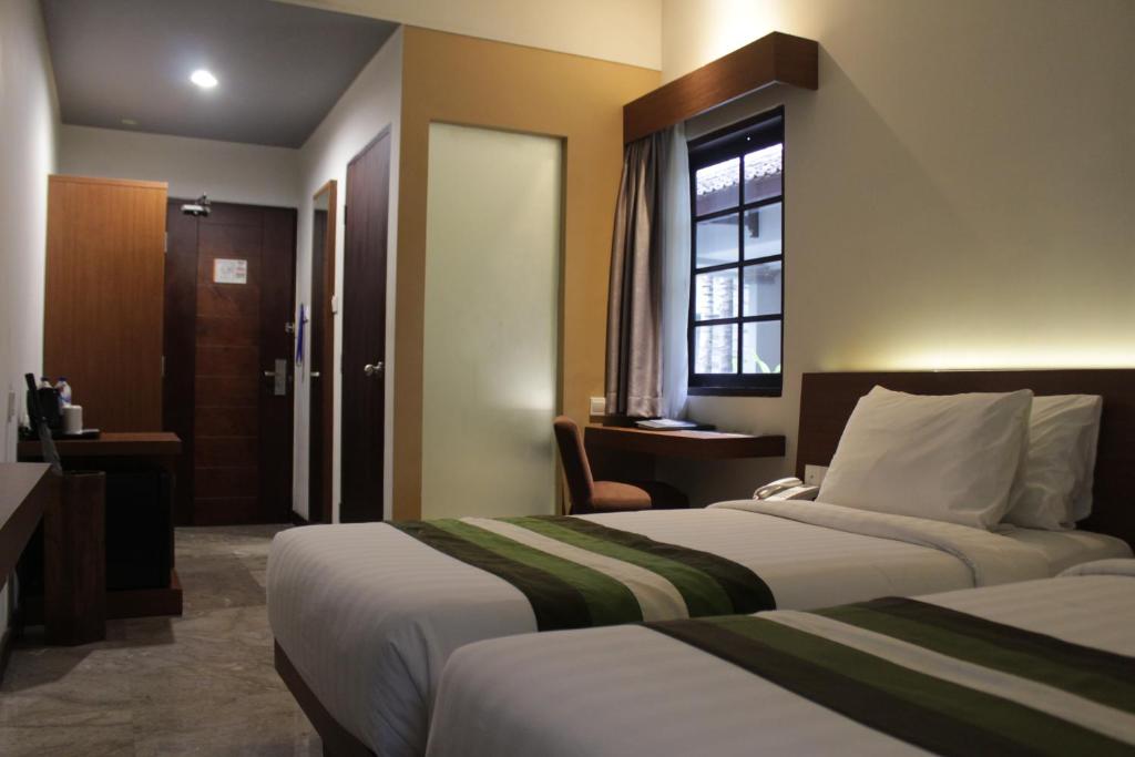 Двухместный (Улучшенный двухместный номер с 1 кроватью или 2 отдельными кроватями) отеля Grand Whiz Hotel Nusa Dua Bali, Нуса Дуа