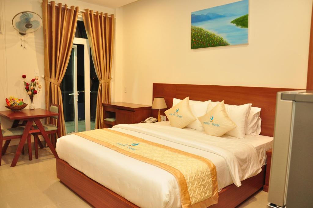 Двухместный (Двухместный номер с 1 кроватью и балконом (для 2 взрослых и 1 ребенка)) отеля Marvin Hotel & Apartment, Дананг