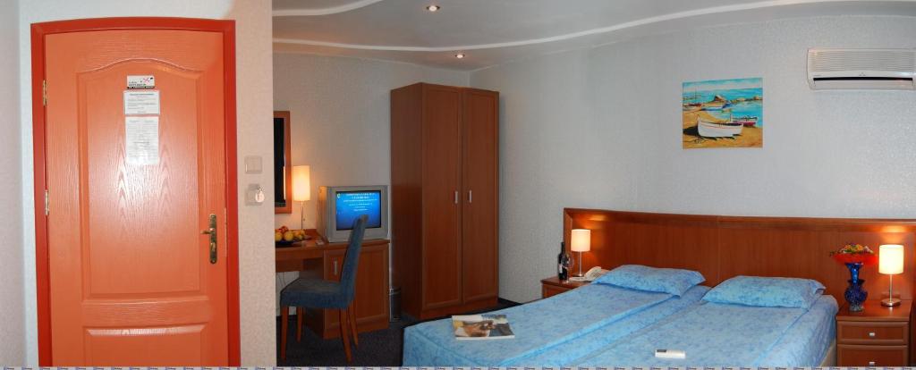 Двухместный (Двухместный номер «Люкс» бизнес-класса с 1 кроватью) отеля Hotel Kibella, София