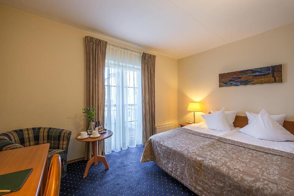 Двухместный (Двухместный номер с 1 кроватью или 2 отдельными кроватями) отеля Grata Hotel, Вильнюс