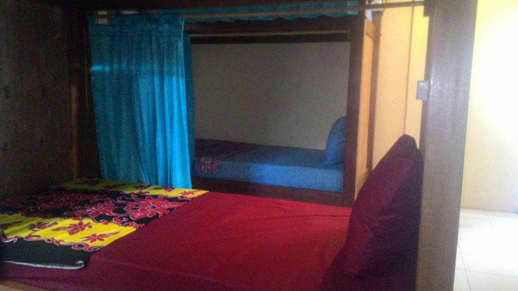 Номер (Кровать в общем 6-местном номере для мужчин и женщин), Liang House and Hostel