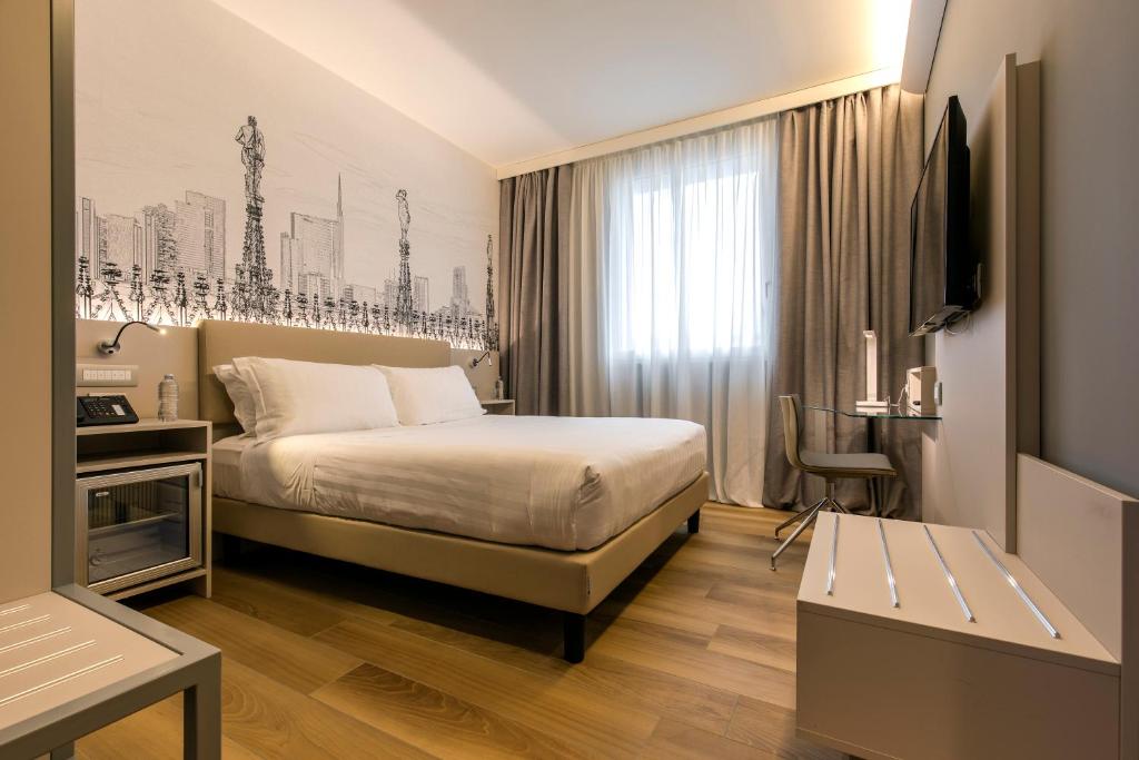 Двухместный (Улучшенный двухместный номер с 1 кроватью) отеля 43 Station Hotel, Милан