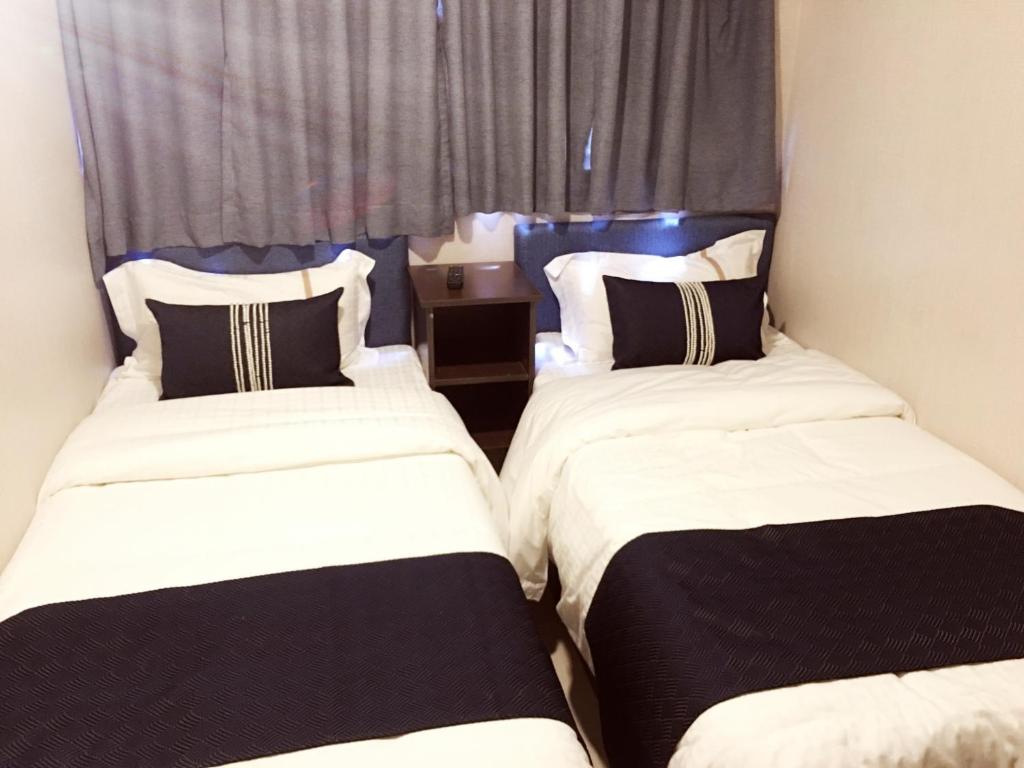 Двухместный (Двухместный номер с 2 отдельными кроватями) гостевого дома Seasons Hotel, Гонконг (город)