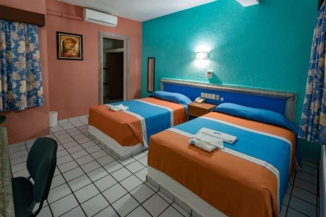 Двухместный (Двухместный номер с 2 отдельными кроватями) отеля Hotel Acuario, Сьюдад-дель-Кармен