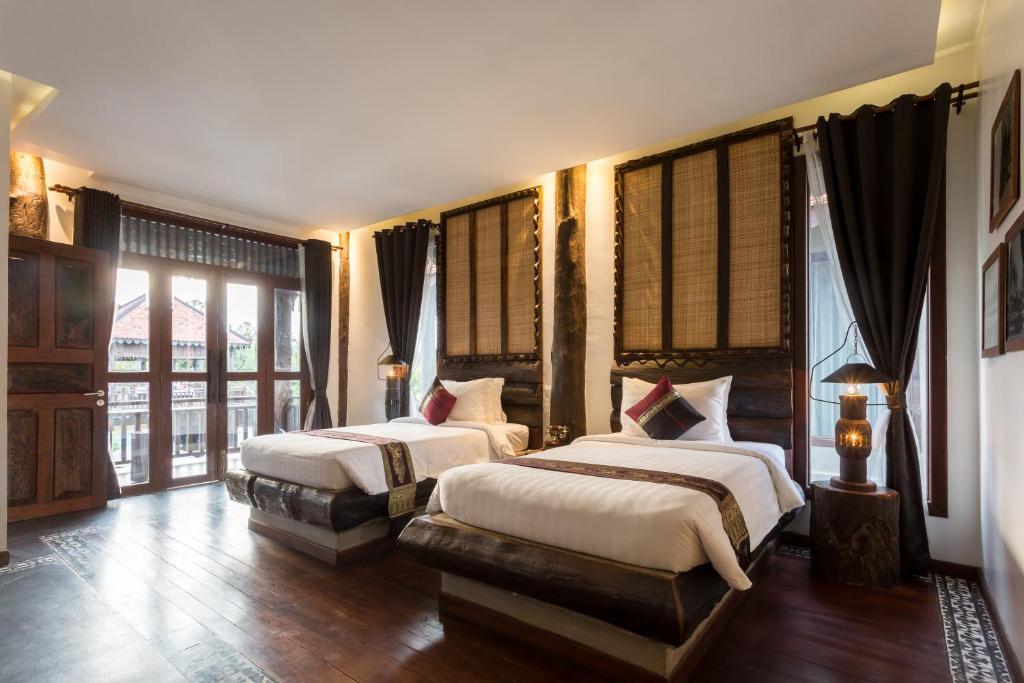 Двухместный (Двухместный номер «Премьер Делюкс» с 2 отдельными кроватями и балконом) отеля Java Wooden Villa & Residence, Сием Рип