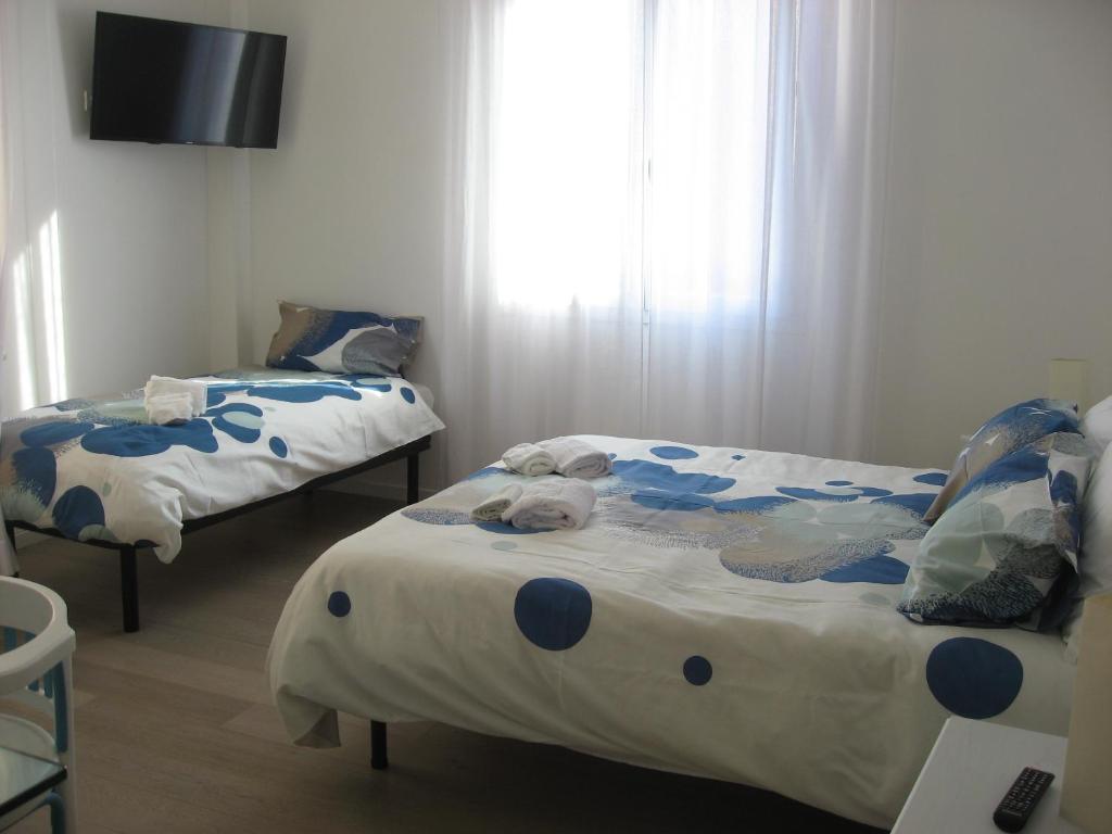 Двухместный (Двухместный номер Делюкс с 1 кроватью или 2 отдельными кроватями - 2 этаж) отеля Ramo Rosso di Paolo Natalini, Болонья