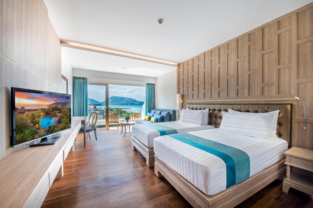 Двухместный (Двухместный номер Делюкс с 1 кроватью или 2 отдельными кроватями и видом на море) курортного отеля Diamond Cliff Resort & Spa, Пхукет