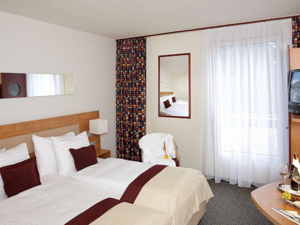 Двухместный (Стандартный двухместный номер с 2 отдельными кроватями) отеля Mercure Salzburg City, Зальцбург