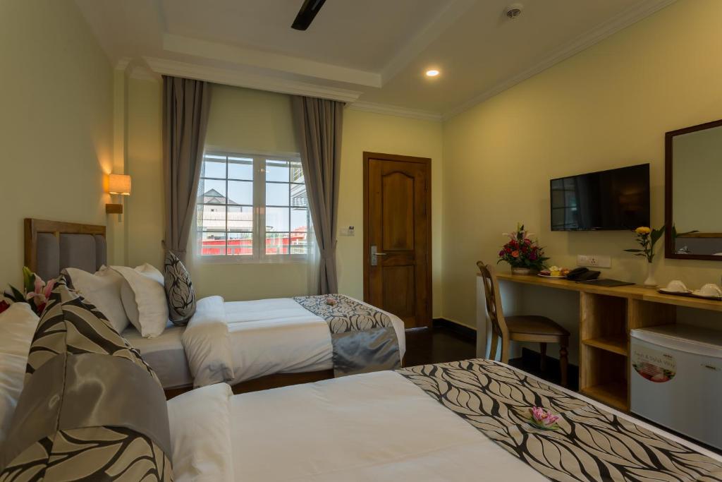 Двухместный (Двухместный номер Делюкс с 2 отдельными кроватями и видом на город) отеля Grand Bayon Siem Reap Hotel, Сием Рип