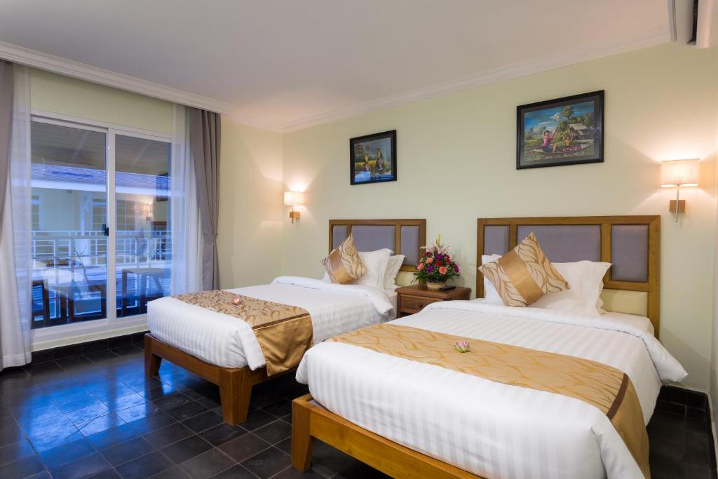 Двухместный (Двухместный номер Делюкс с 2 отдельными кроватями и балконом) отеля Grand Bayon Siem Reap Hotel, Сием Рип