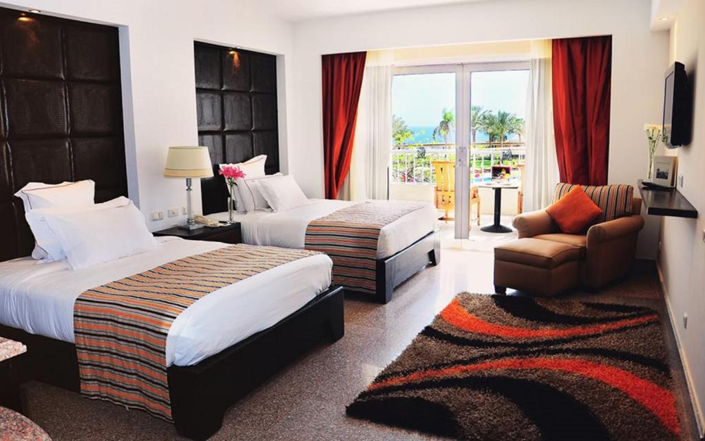Двухместный (Улучшенный двухместный номер с 1 кроватью и видом на море) курортного отеля Monte Carlo Sharm Resort & Spa, Шарм-эль-Шейх