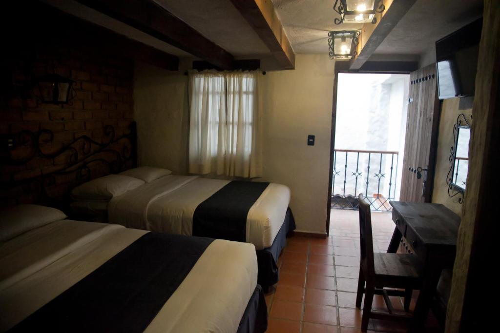 Двухместный (Двухместный номер с 2 двуспальными кроватями) отеля Hotel Casa Índigo, Сан-Кристобаль-де-лас-Касас