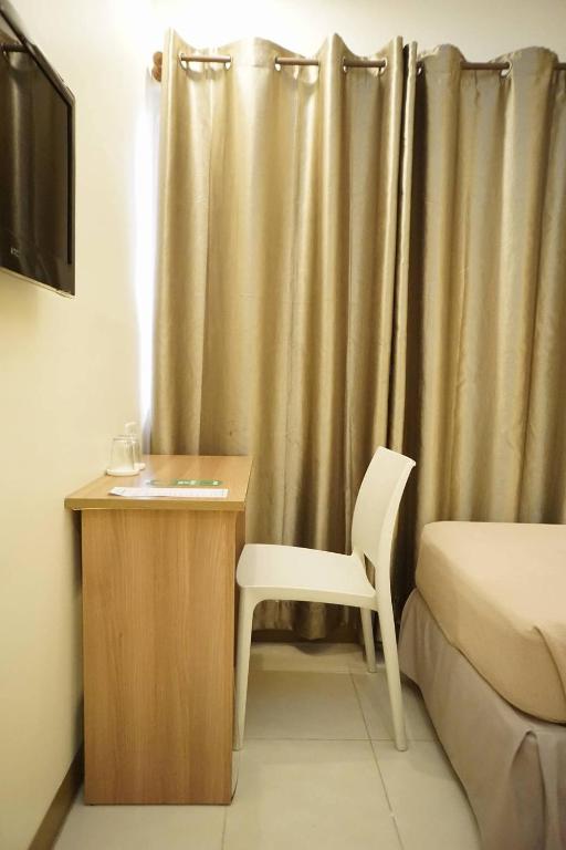 Двухместный (Двухместный номер с 2 отдельными кроватями) отеля The Center Suites, Себу