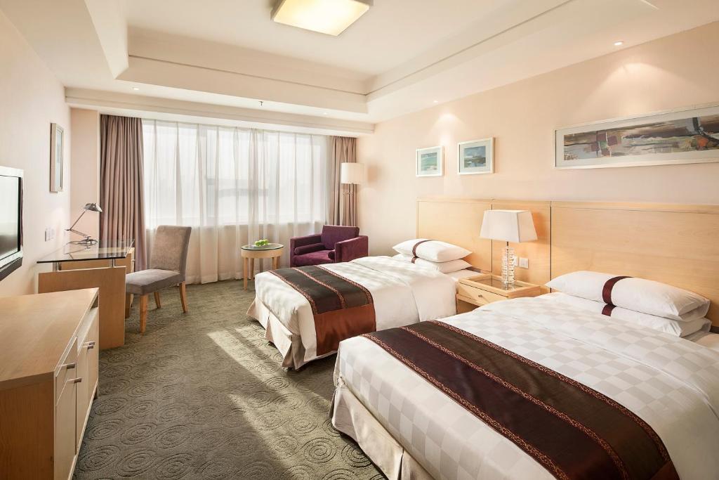 Двухместный (Улучшенный двухместный номер с 2 отдельными кроватями — Для некурящих) отеля Ramada Plaza Shenyang City Center, Шэньян