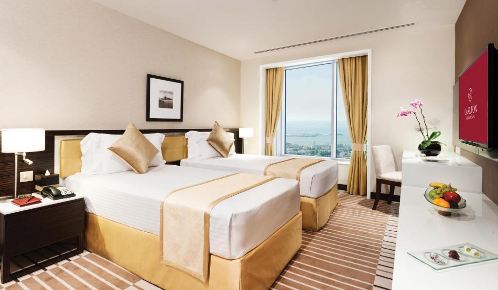 Сьюит (Панорамный Люкс с двумя спальнями) отеля Carlton Downtown Hotel, Дубай