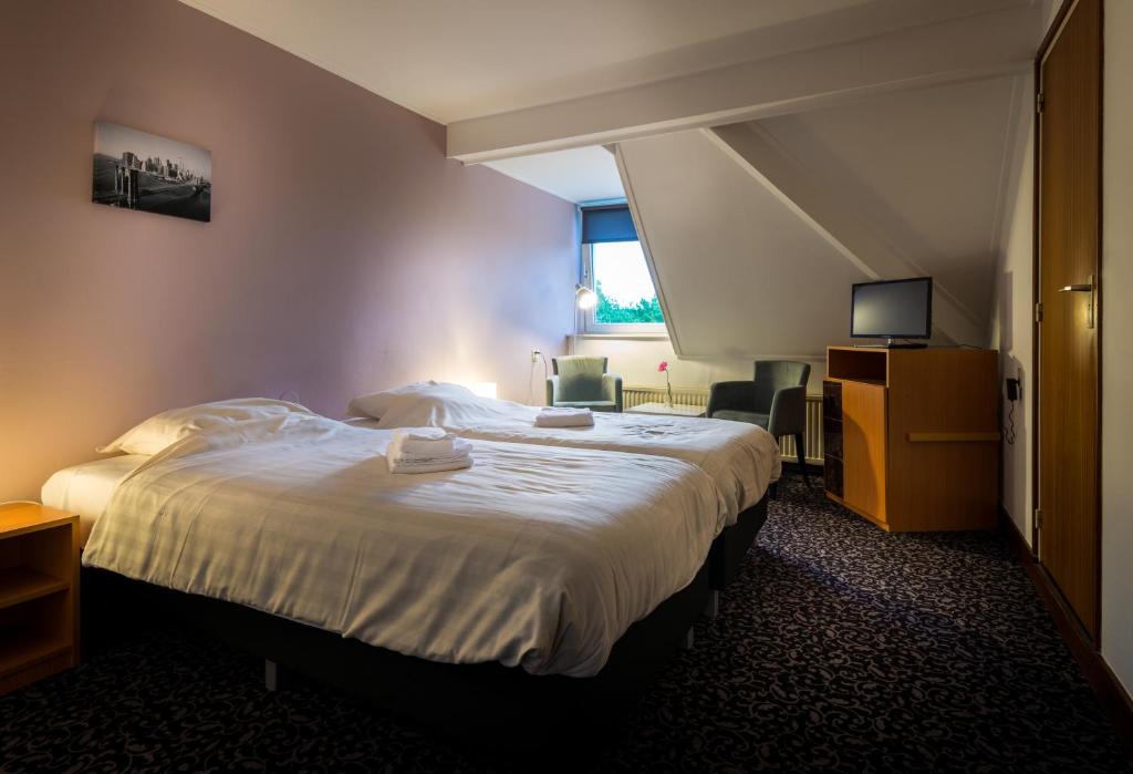 Двухместный (Небольшой двухместный номер с 2 отдельными кроватями) отеля Hotel Eperland, Маастрихт