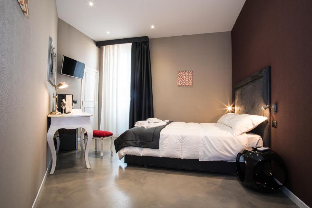 Двухместный (Двухместный номер с 1 кроватью или 2 отдельными кроватями, вид на город) отеля Roma 2B, Рим