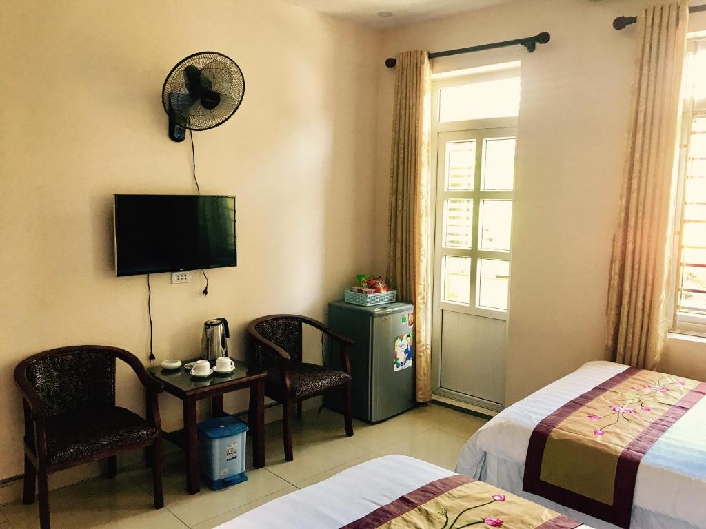 Двухместный (Двухместный номер эконом-класса с 1 кроватью или 2 отдельными кроватями) отеля Binh Minh Hotel, Ниньбинь