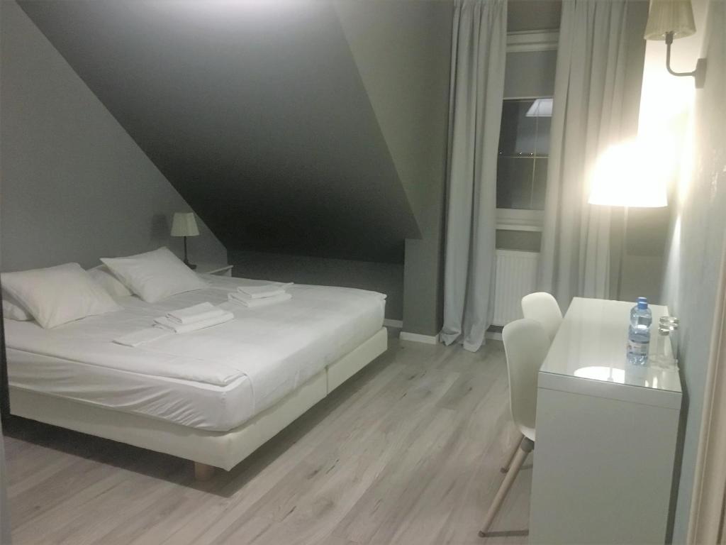 Двухместный (Двухместный номер Делюкс с 2 отдельными кроватями) семейного отеля Grota Bochotnicka, Казимеж-Дольны