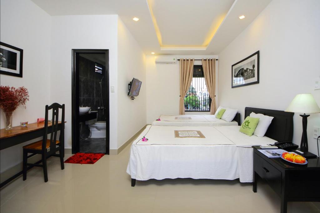 Двухместный (Двухместный номер с 2 отдельными кроватями и видом на город) семейного отеля Hoi An Green View Homestay & Villa, Хойан