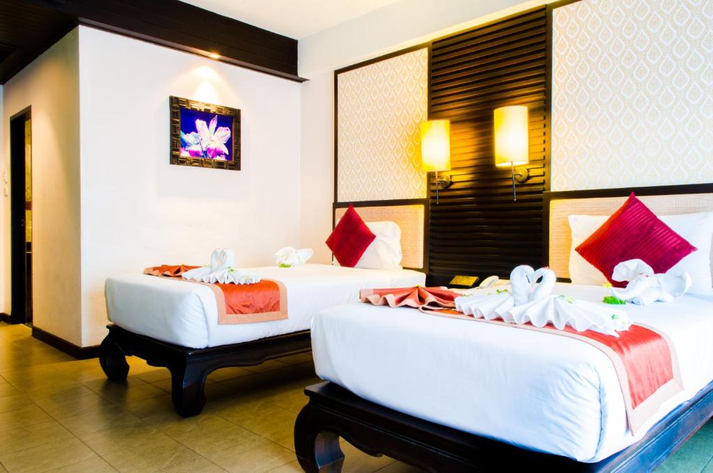 Двухместный (Двухместный номер Делюкс с 1 кроватью или 2 отдельными кроватями и видом на бассейн) курортного отеля Nipa Resort, Пхукет