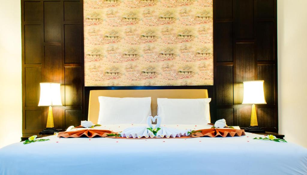 Двухместный (Двухместный номер Делюкс с 1 кроватью или 2 отдельными кроватями и гидромассажной ванной под открытым небом) курортного отеля Nipa Resort, Пхукет
